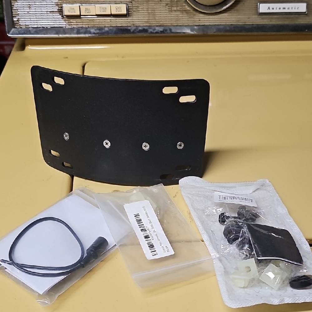 KeMI MOTo License Plate Mount With After Market Screws.